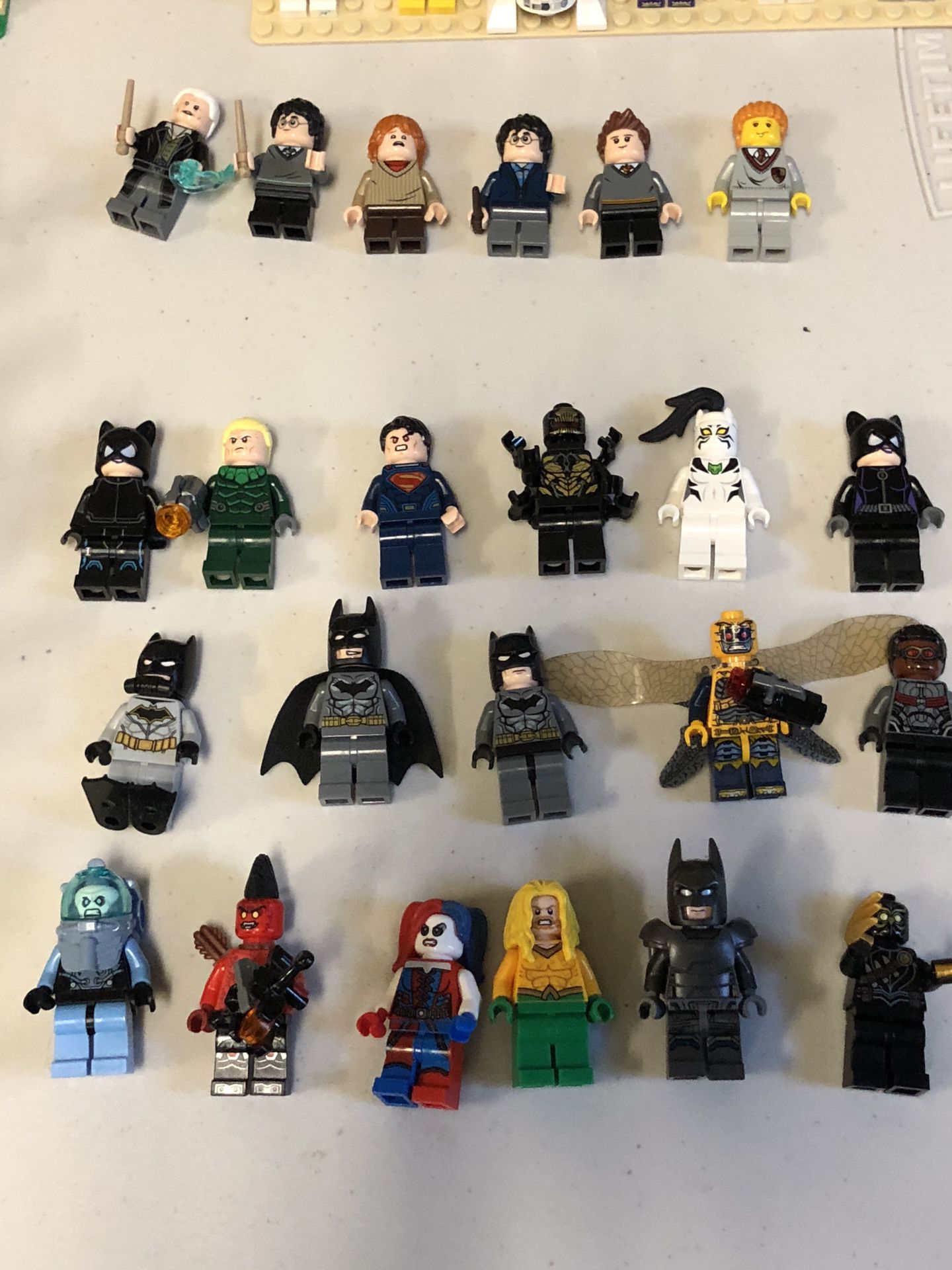 Lego super hero and Harry Potter figures