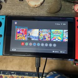 Nintendo Switch Original (Plus 256GB Micro SD card installed, and two games)