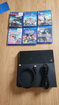 PS4 Console with 6 Games and Cables