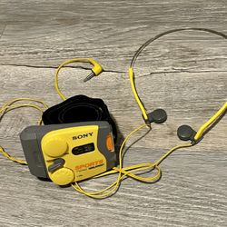 Vintage Sony Walkman SRF88 sports Walkman FM AM radio tuner with wrist arms band tested good yellow