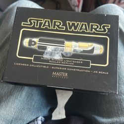 This item is a Master Replicas .45 scaled replica of Mace Windu's lightsaber from Star Wars: Attack of the Clones.  It is a licensed collectible featu
