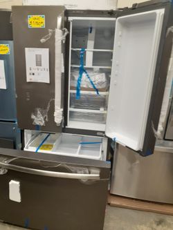 Brand new GE 36in. Slate french doors refrigerator with interior ice & water dispenser