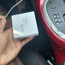 White AirPod 4 With MagSafe Charging Case