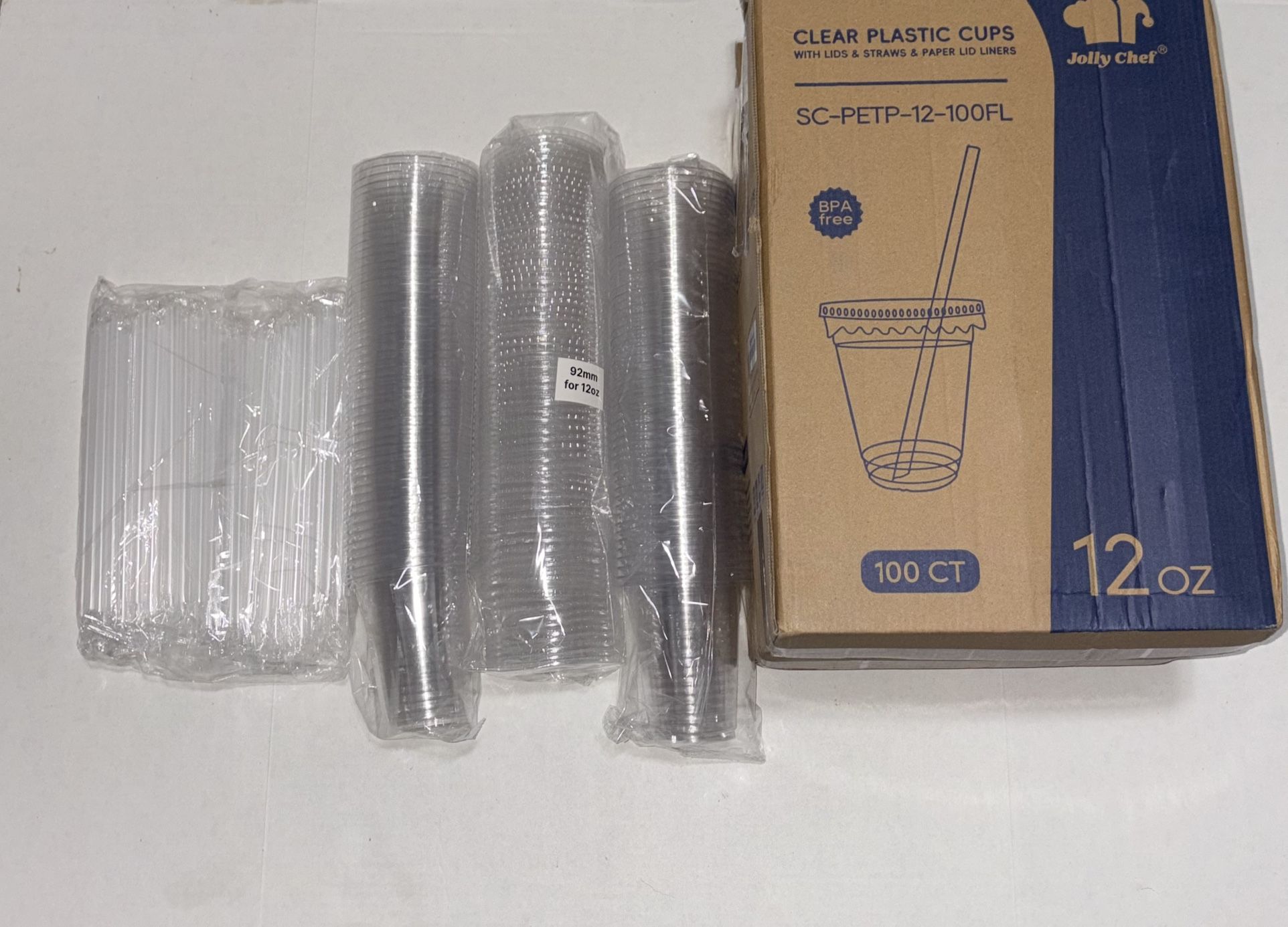 100 12 oz plastic cups with lids/straws
