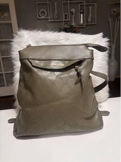 olive green Steve Madden backpack