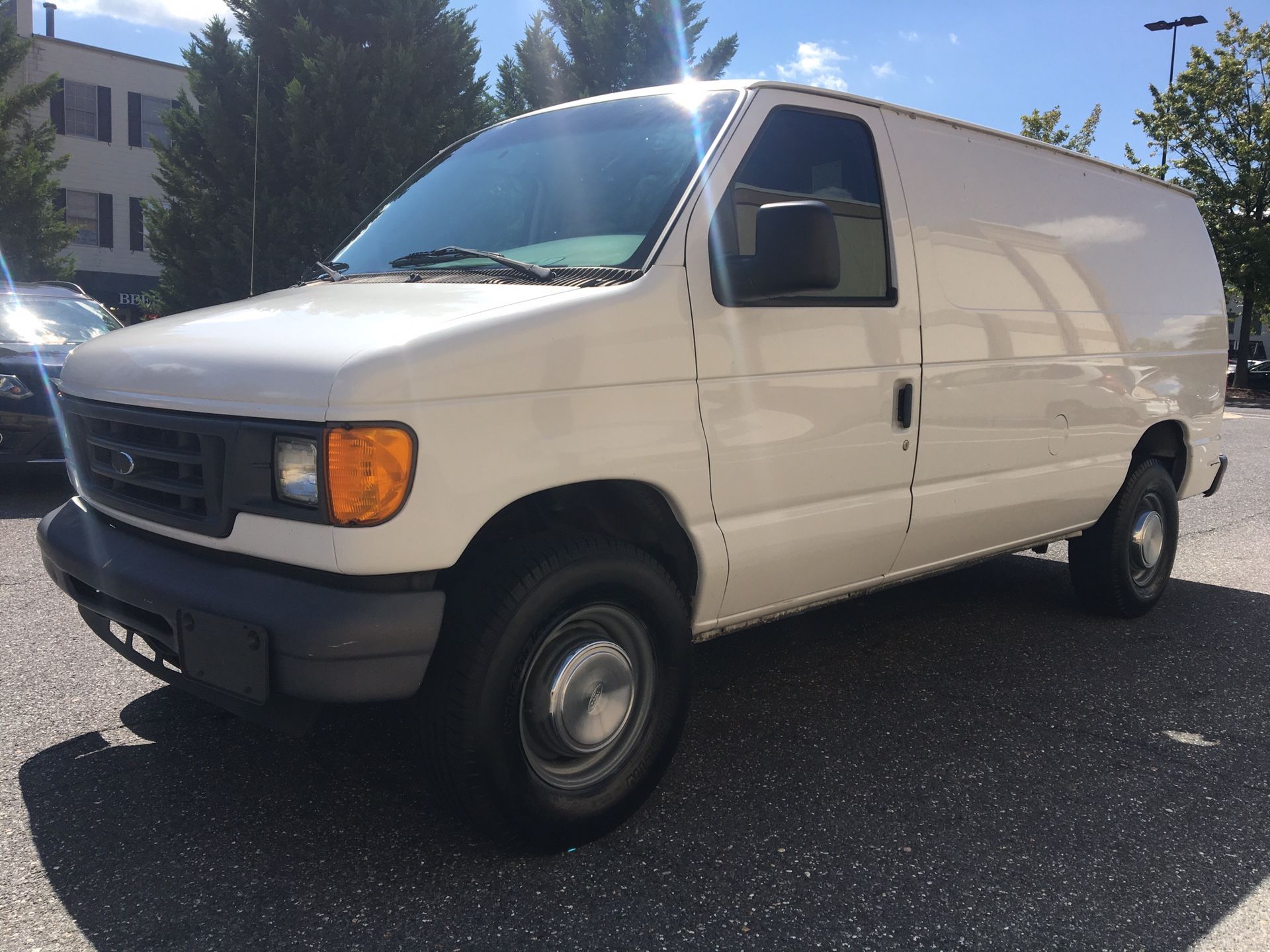 2000 Ford E3 50 cargo van looks and runs great ladder racks and work shelves runs and drives great no problems