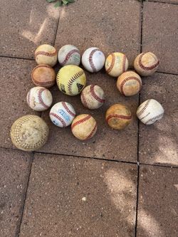 Lot of 15 Used Baseballs 4 inches to 2 1/2 inches. Still Gets The Job Done!