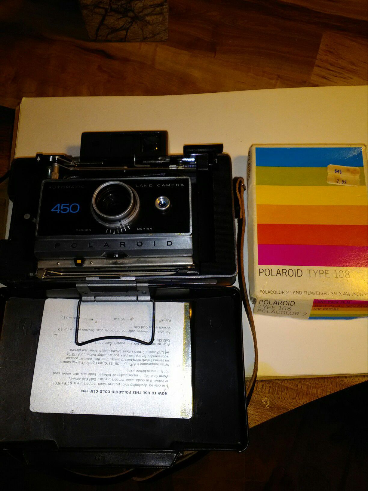 Vintage 1970s Polaroid 450 auto land camera with pack of film