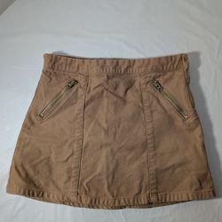 Gymboree.  tan or brown mini skirt with zipper details. Girls size 7