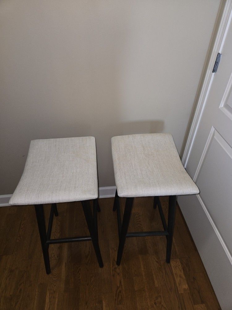 2 Four Hands Saddle Stools