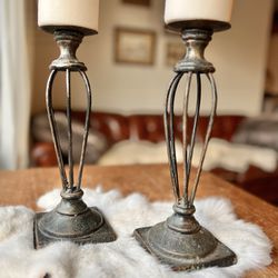 Pair of weighty metal pillar candle holders / 11” tall / $32 pair