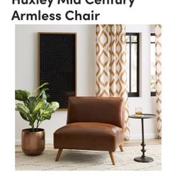 Pair Of Mid Century Leather Chairs