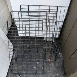 Metal wire grates with attachments.