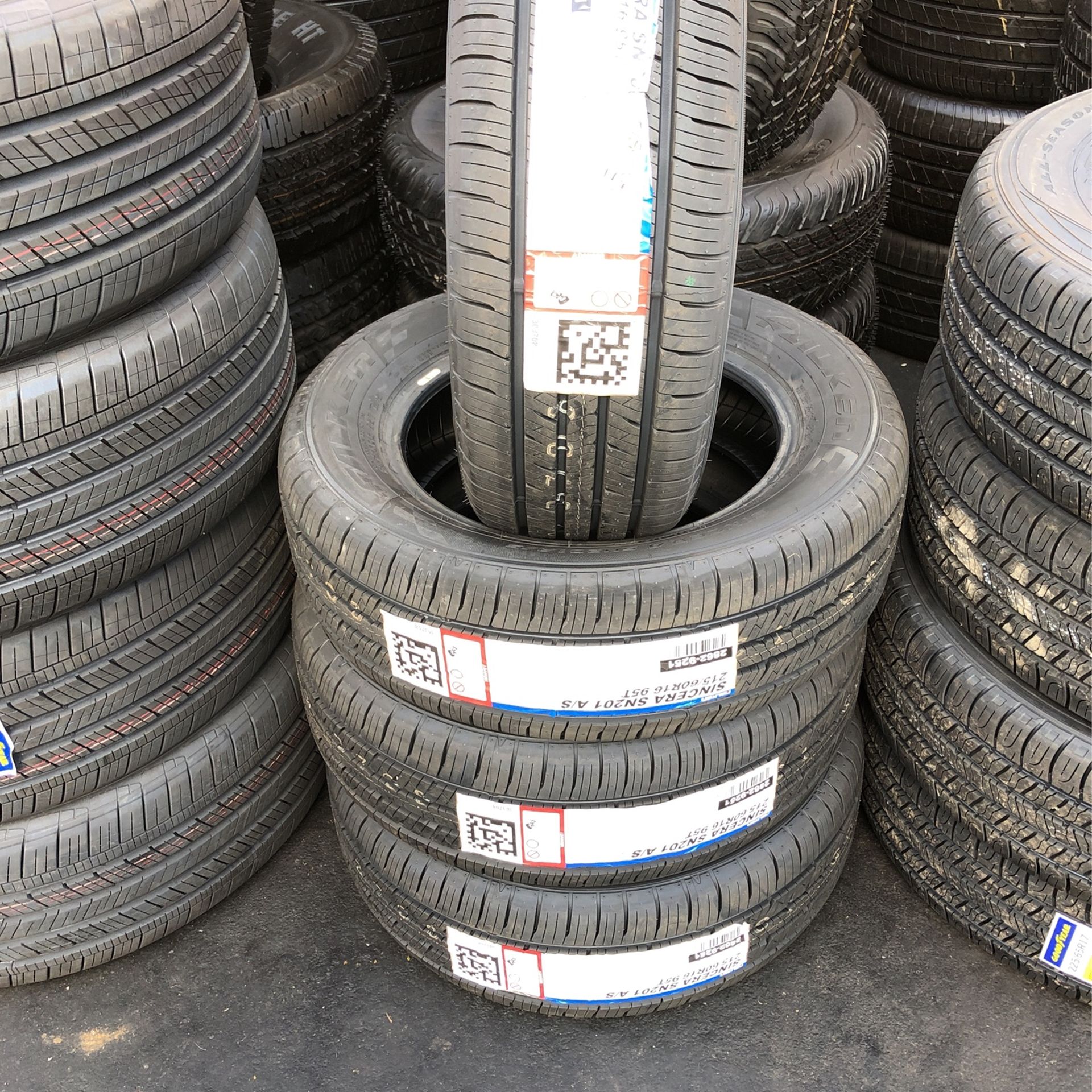 SET OF FOUR NEW TIRES215/6016