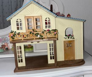2 Sylvanian families homes, some furniture and car