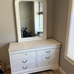 Beautiful white dresser with mirror. 