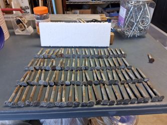 LØØK!! - VINTAGE LOT OF 100 RAILROAD,  TELEPHONE POLE DATE NAILS. from the 20's, 30's, 40's, 50's, 60's, 70's. ALL ONE PRICE! asking $60.00