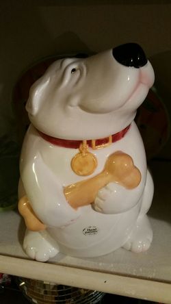 Ceramic dog holding a bone jar