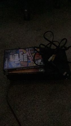 PS2 fat with GTA Vice City and Guitar hero 3