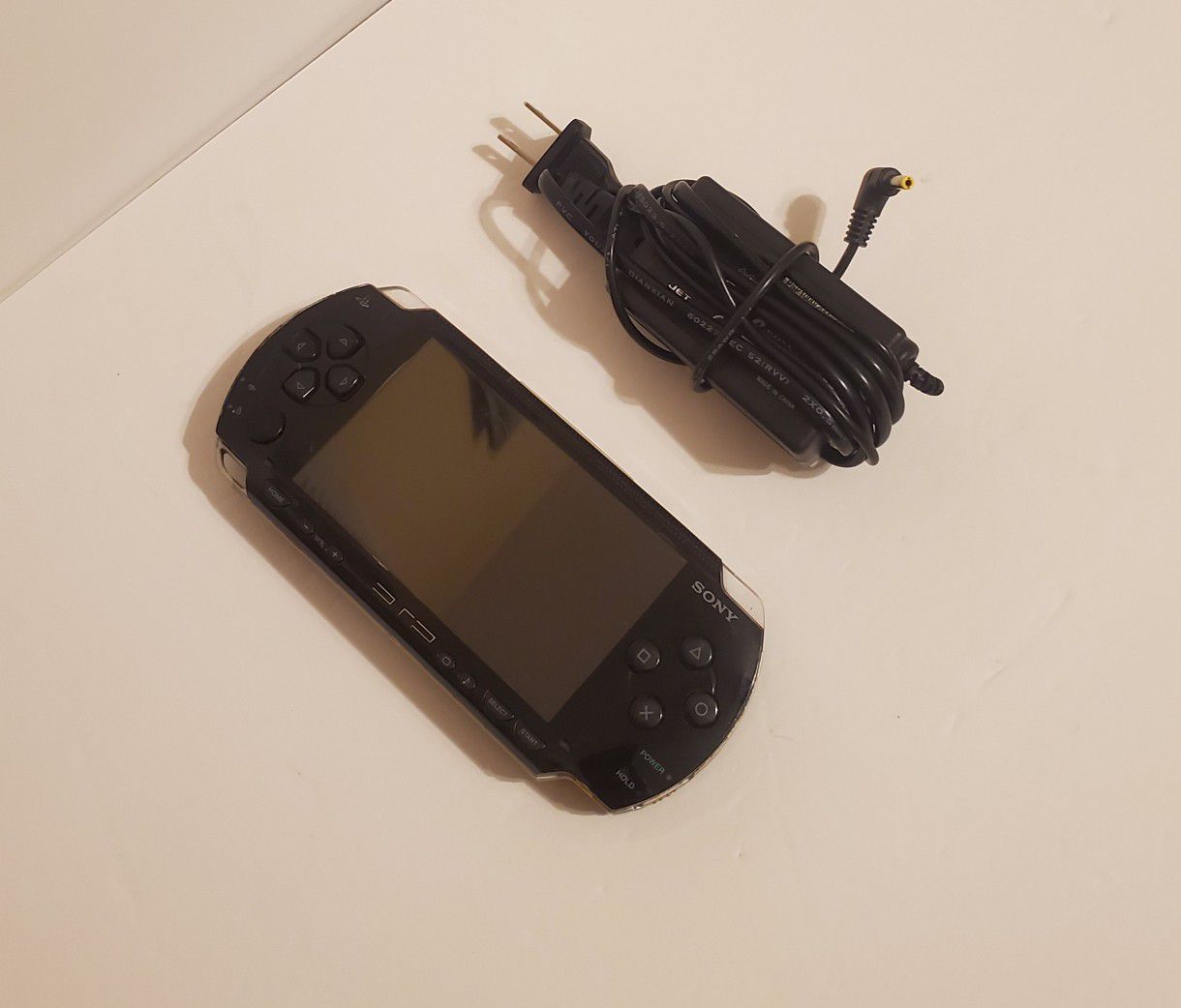Sony PlayStation Portable PSP 1001 with charger tested