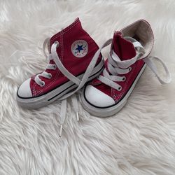 Red Kid high top Converse shoes
