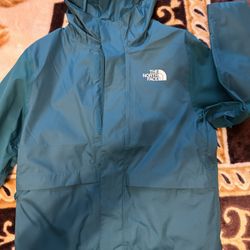 Youth Teal North face Rain Jacket.
