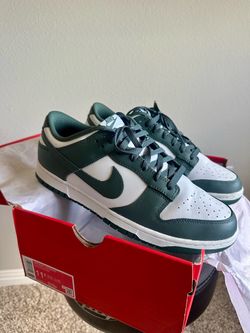 Nike Dunk Low Retro in the classic White/Vintage Green