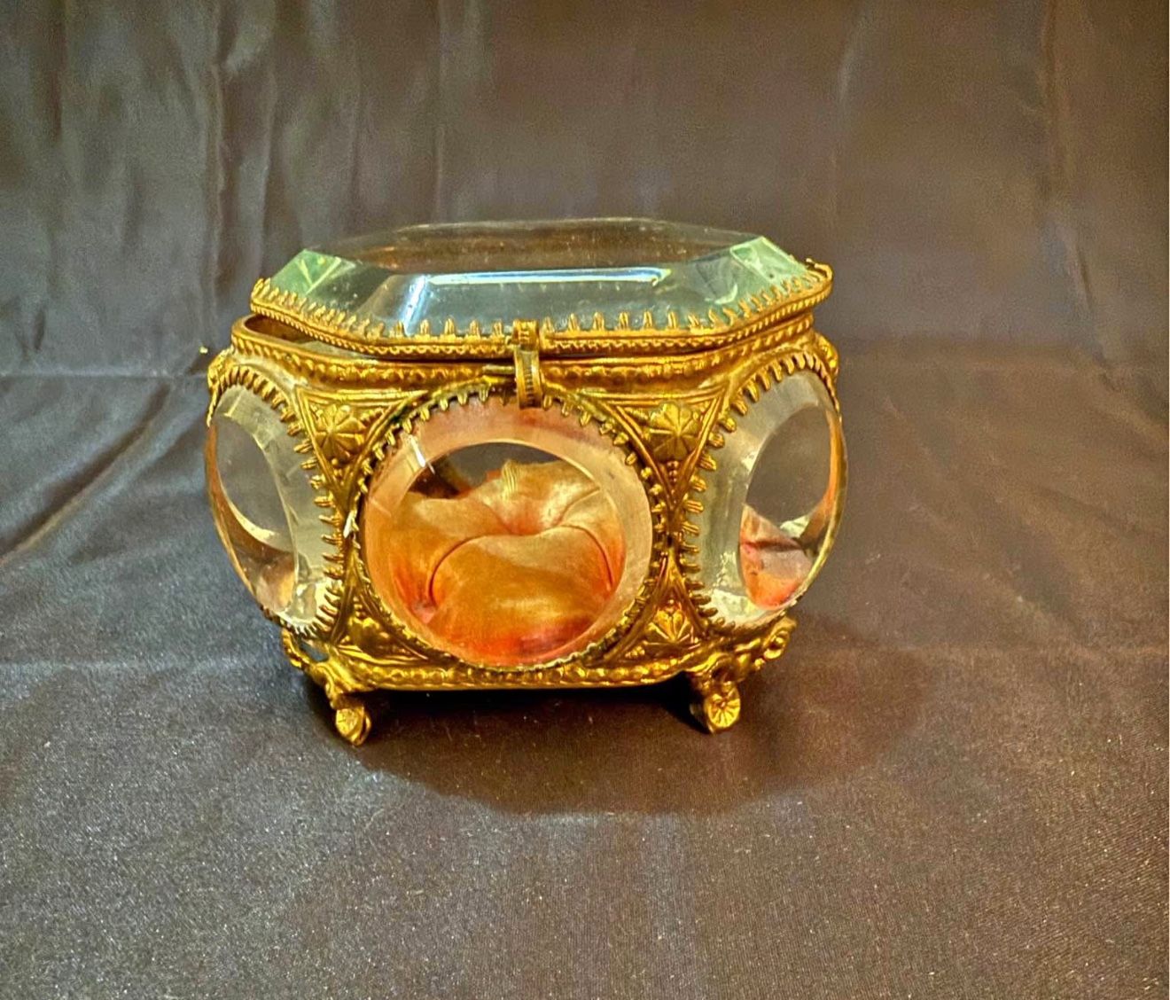 Antique French ormolu and beveled glass jewelry box with velvet lining.  Ormolu, which is French for "gilded bronze," refers to the technique of apply
