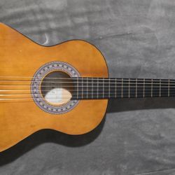 GUITARRA ACOUSTICA TAMAÑO 3/4 $39