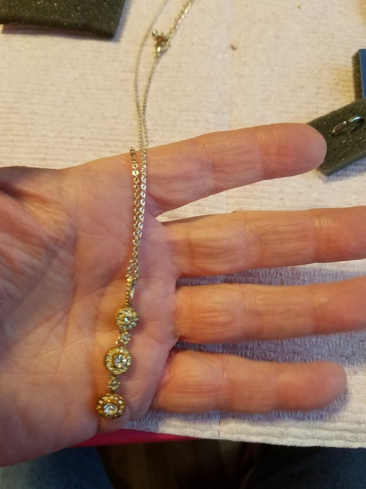From Avon CZ diamond(April birthstone) gold plated Necklace Please go to my page and see other items that I have listed thank you for your interest