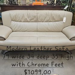 Sofa Leather w Chrome feet modern We are located at 2811 East Bell road. Another Time Around Furniture.