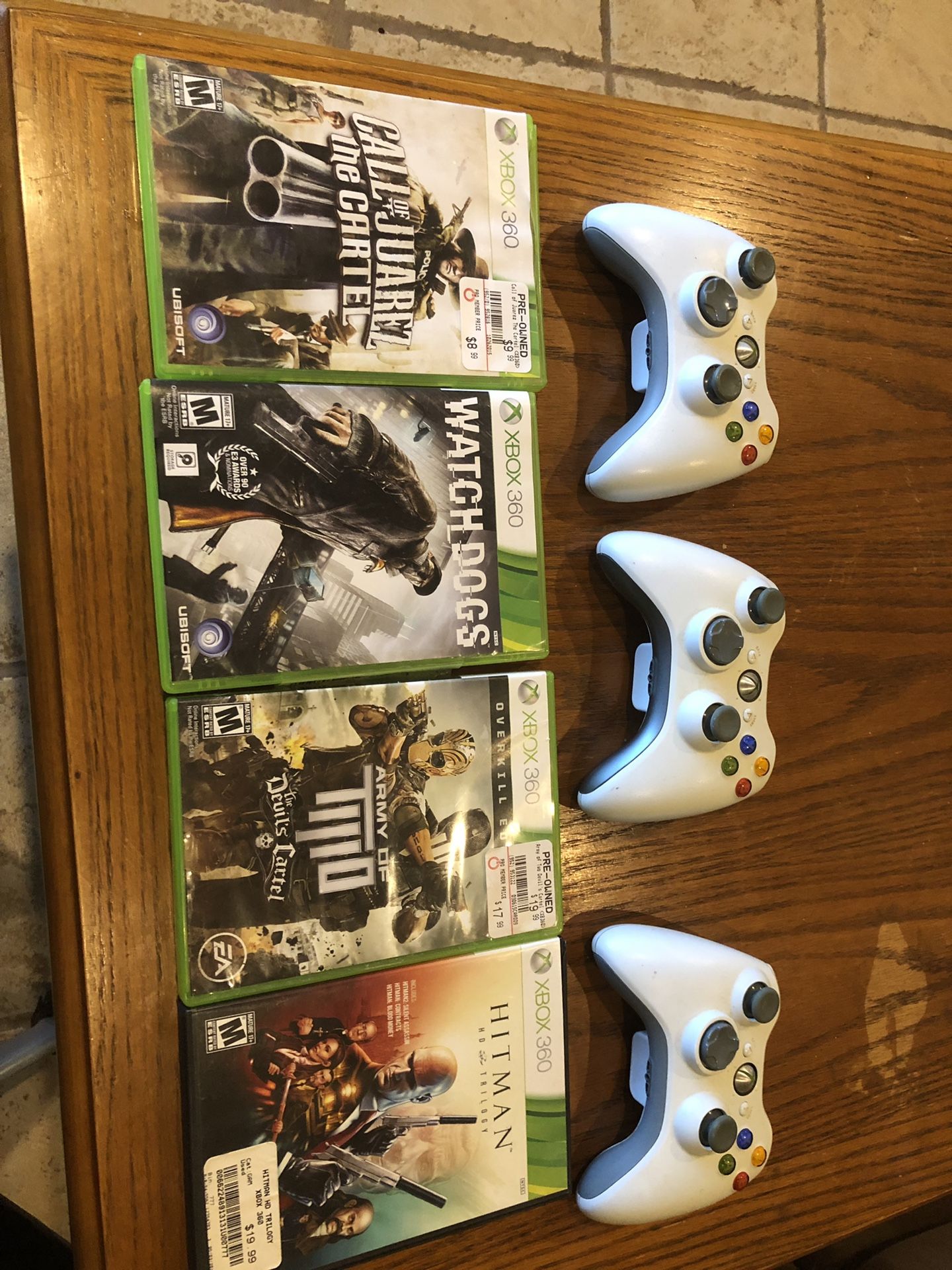 (1) Xbox 360, 3 controllers and 35 games