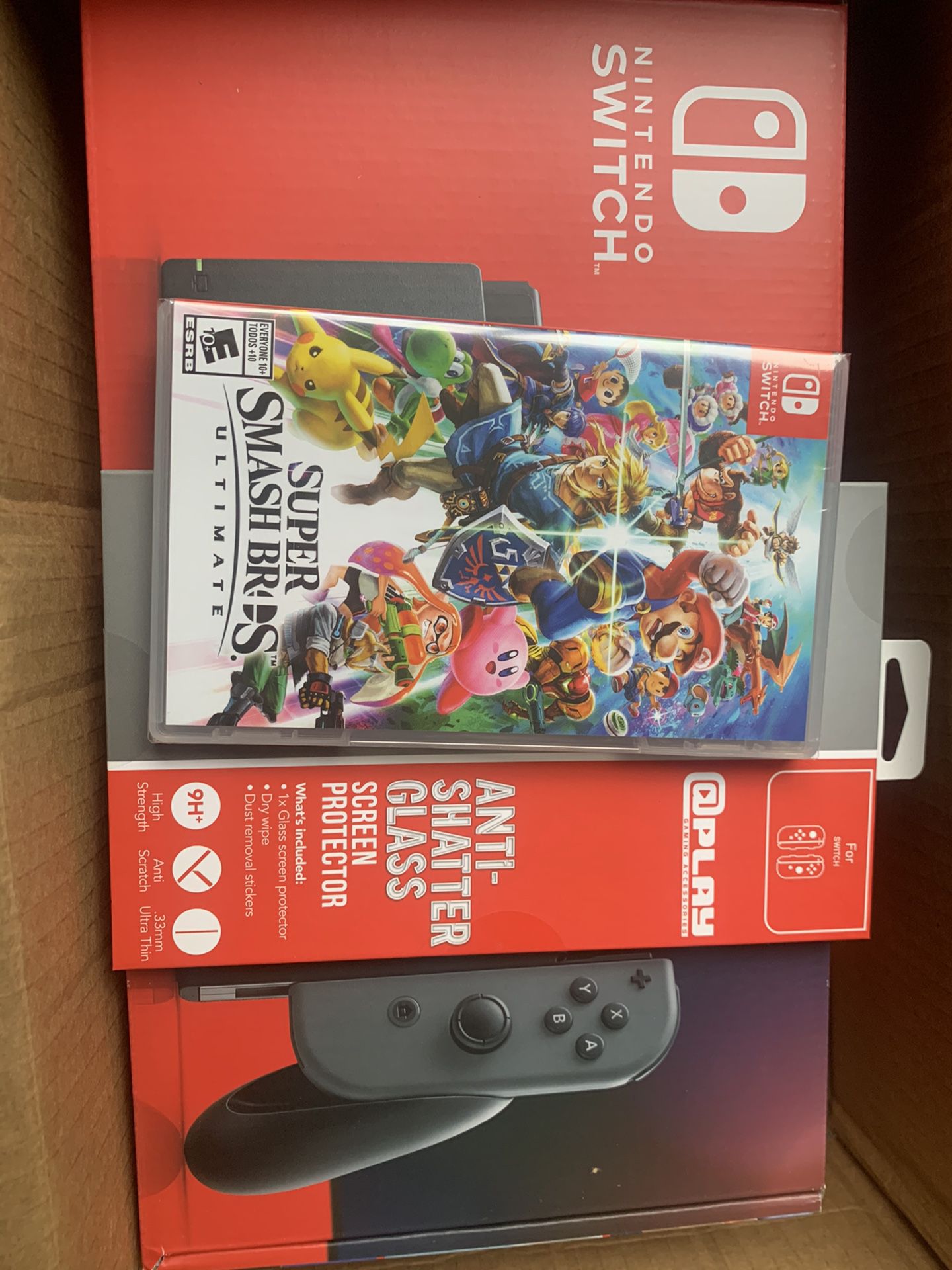 Nintendo Switch Gray Joy-Con with Screen Protector and Super Smash Bros. Ultimate System Bundle