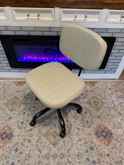 Cream armless office chair