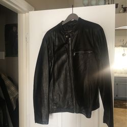 Medium size brown leather jacket