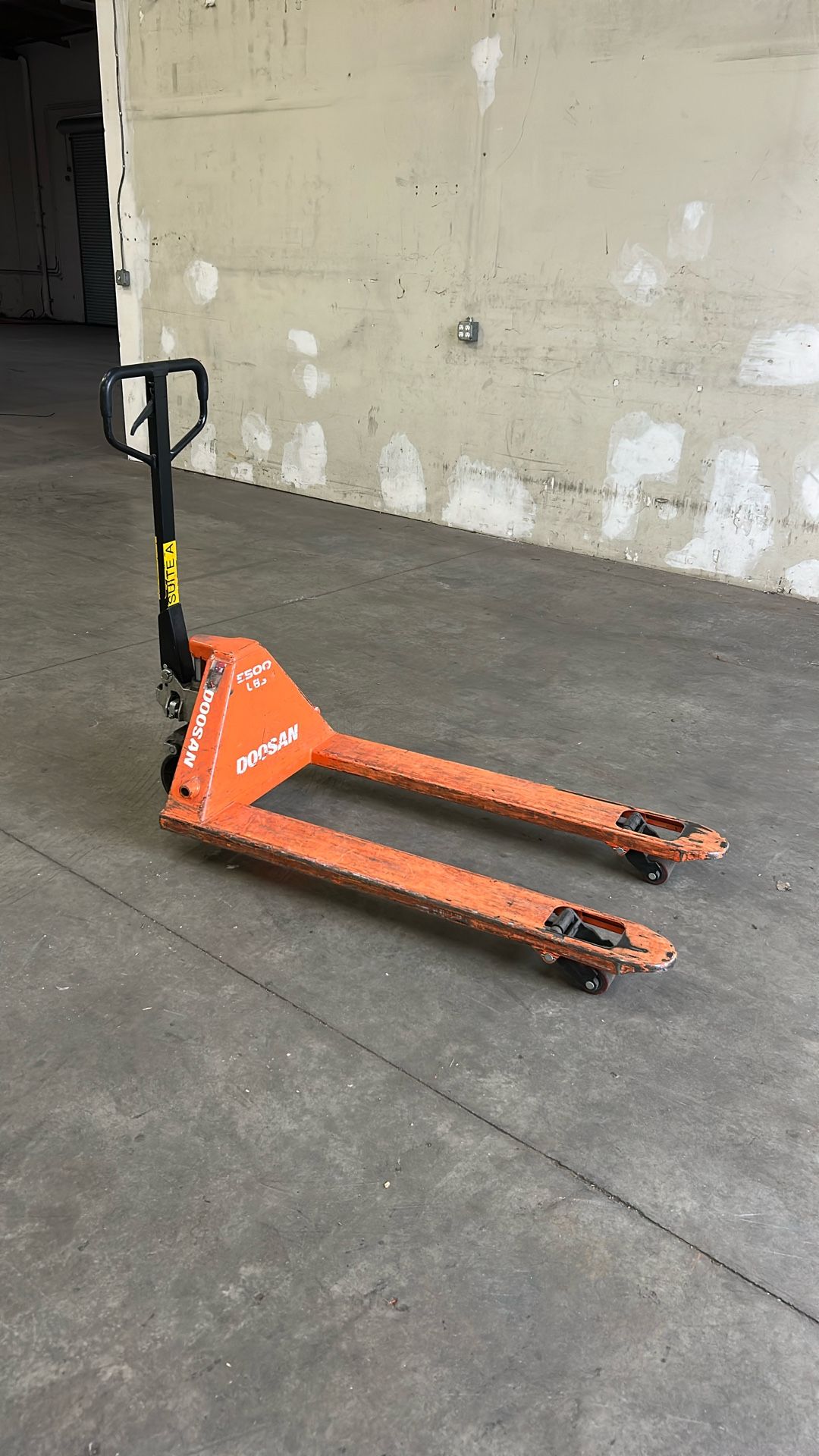 Pallet jack 50 bucks works good