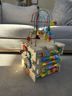 KidKraft Deluxe Activity Cube educational toy designed for toddlers.