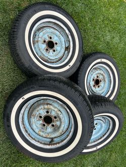 14”  ford wheels and tires.