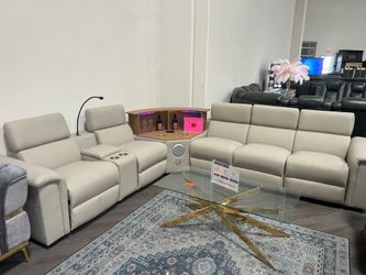 Brand new luxury leather sectional w/ pop up bar