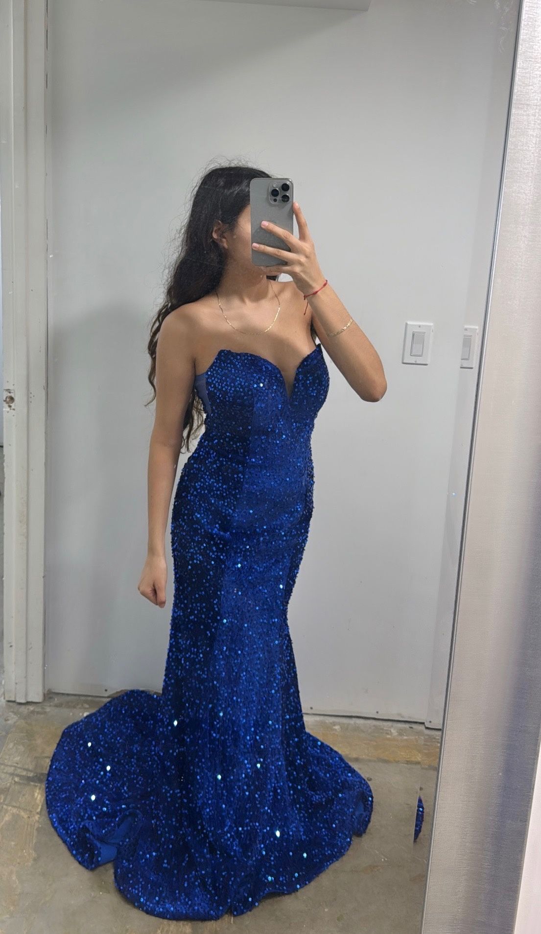strapless blue sequin dress is brand new. Perfect for special occasions/prom