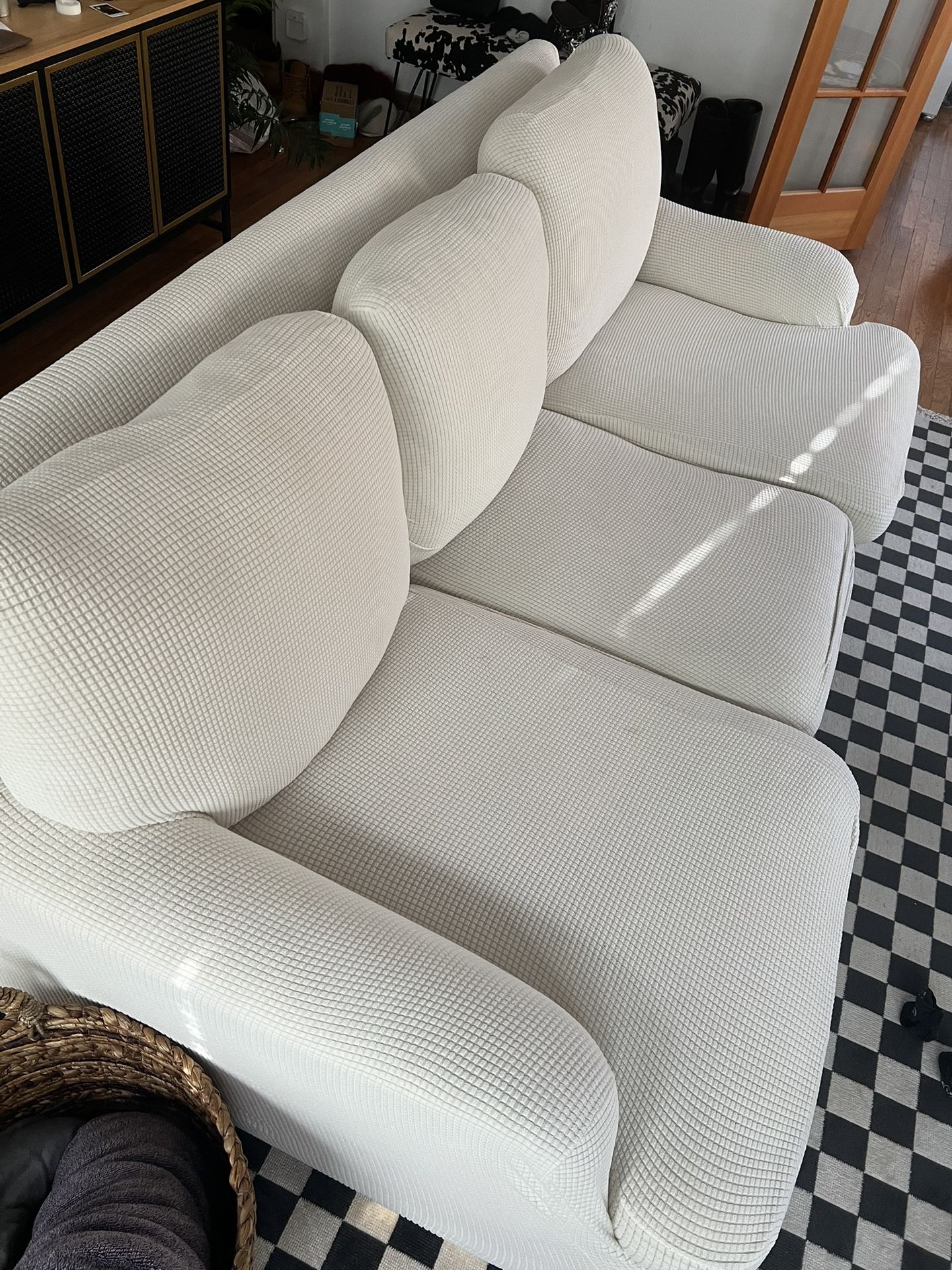 Couch With White Couch Cover 