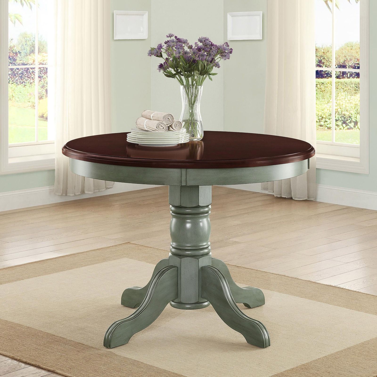Better Homes and Gardens Cambridge Place Dining Table DESCRIPTION:This modern table adds a contemporary feel to your dining room or kitchen area Ide