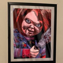 custom art piece of chucky from childs play on black frame