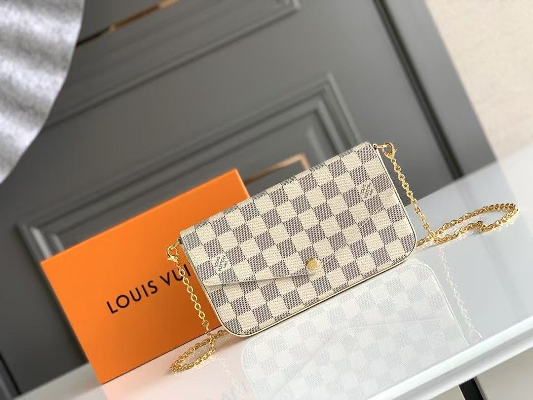 Classic white fashionable luxury women's handbag, wallet, and tote bag