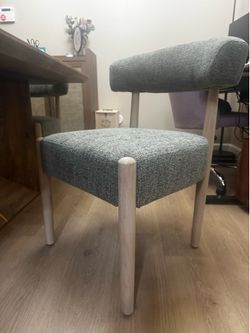 modern barrel-back upholstered dining chair