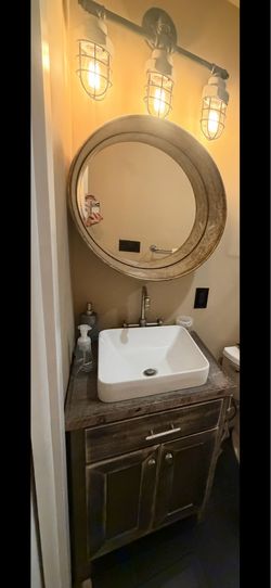 Bathroom vanity with mirror and sink