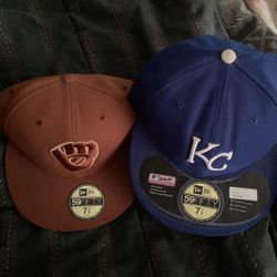 caps with only one use are original the royal blue is 7/4 the brown color 7-3/8