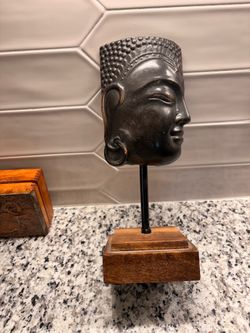 Jennifer Farrell Buddha face sculpture