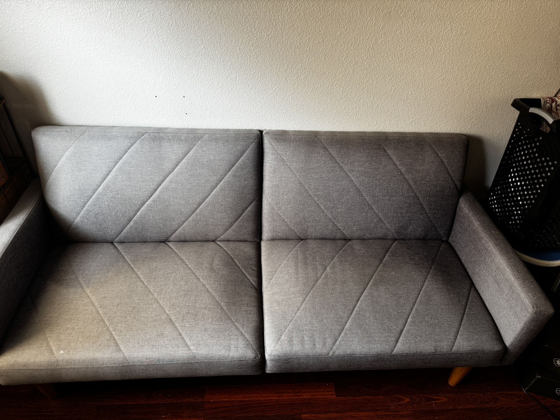 Futon sofa turns into bed works great does have some fading offers welcomed