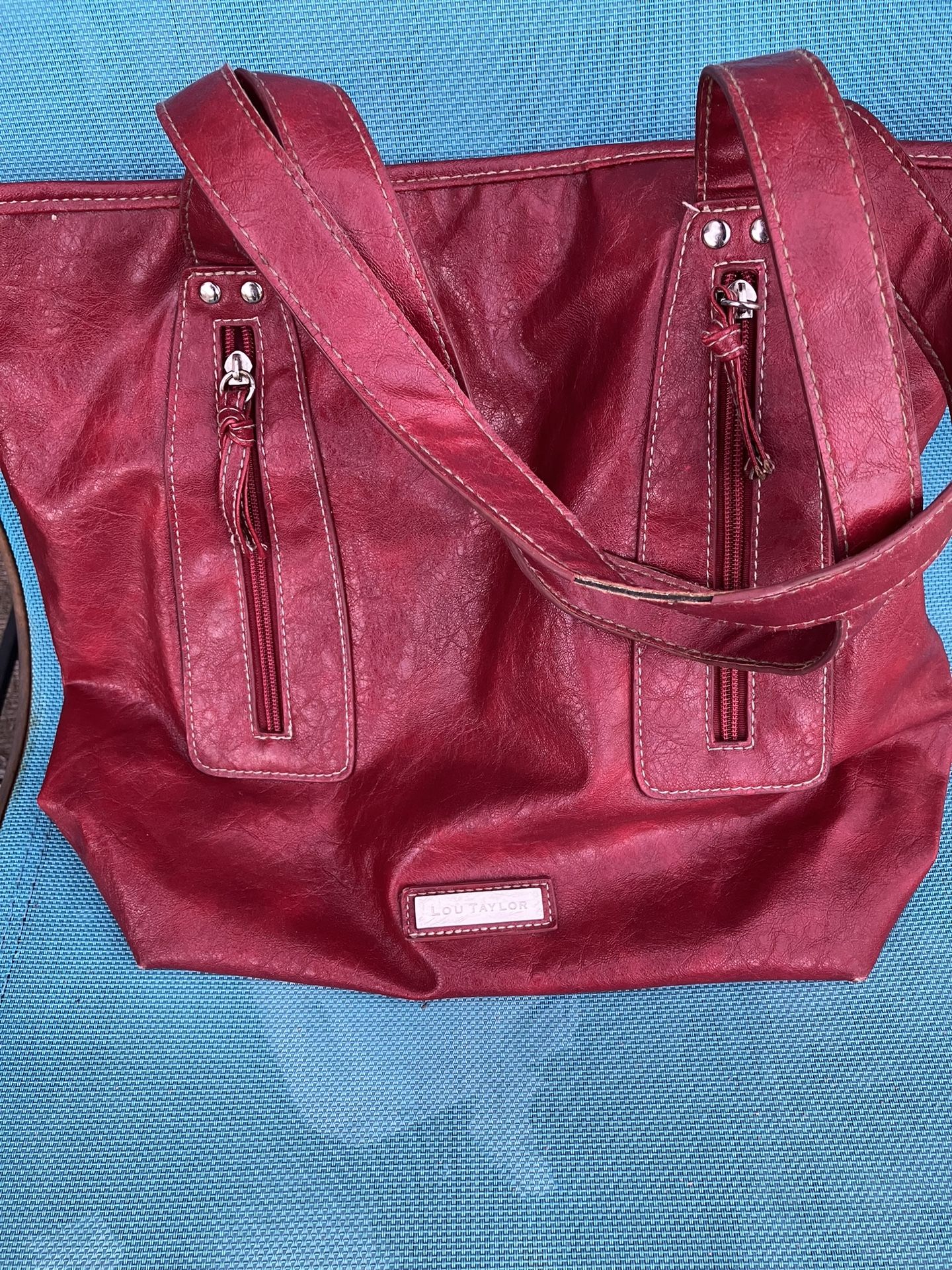 Lou Taylor Genuine Leather Handbag With Dual Handles. 2 Zippered Pockets Outside Bag. Measures 15X14